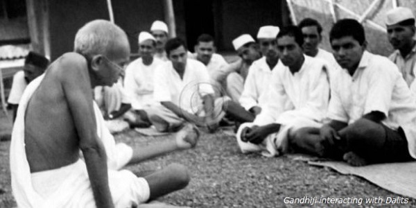 Gandhiji interacting with Dalits